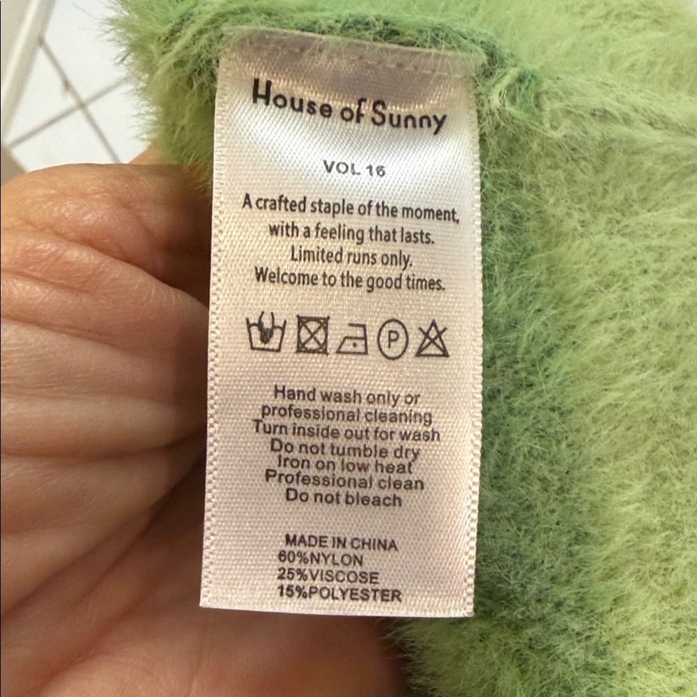 House of sunny
Green Geometric Knit Vest - Picture 5 of 11